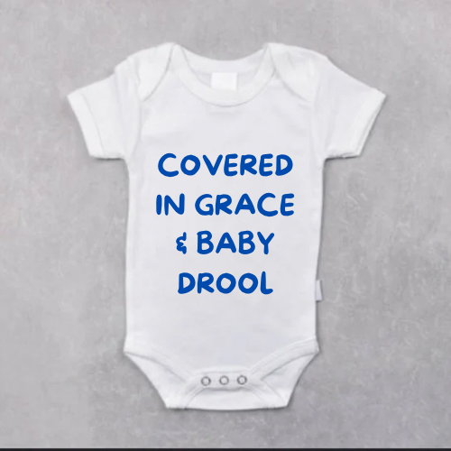 Funny Christian Baby Bodysuit – “Covered in Grace & Baby Drool”